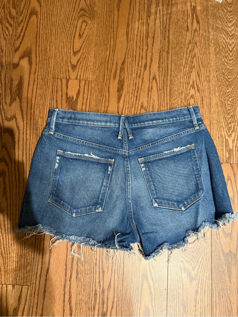 Good American Distressed Blue Denim Cutoff Shorts